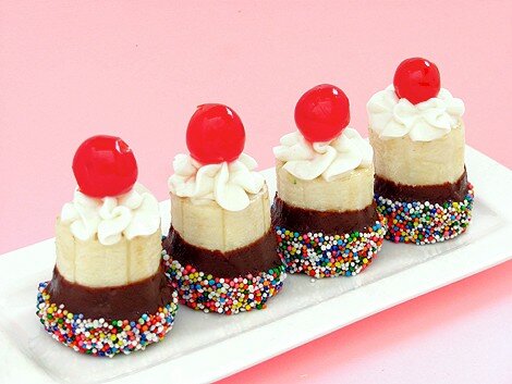 Mini banana splits Mini banana split with gream and sprinkles