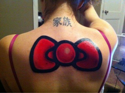 Big Hello Kitty bow tattoo Big Hello Kitty bow tattoo on back