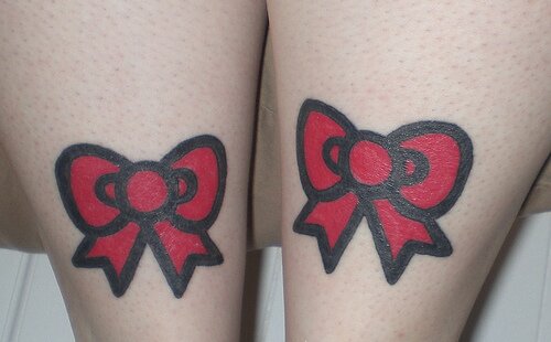 tattoos of bows. Red Hello Kitty ow tattos on
